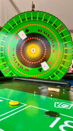 Wheel of Fortune Roulette lottery casino spinning lottery machine Multi-colored colors flicker during the rotation of the drum to select some The position where the arrow will stop Fun game holidaysの写真素材