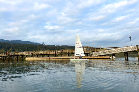 Sailboat on the background of the bridge Quiet water blue sky port moody Esplanade Ave Rocky Point...