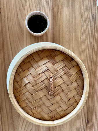 dim sam Traditional Chinese dishes steam dumplings, hot salads, snacks Dam Sam. Top view. Copy space 4 types with different fillings Wooden boxes covered with a wicker lidの写真素材