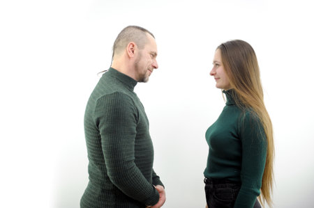 wise father instructing young daughter middle-aged man eyes he counts girl real head with pigtail...