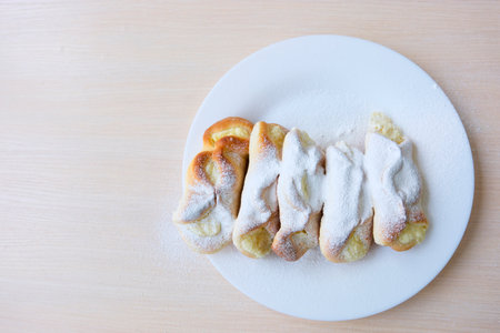 freshly baked lemon gugelhupf with icing sugar