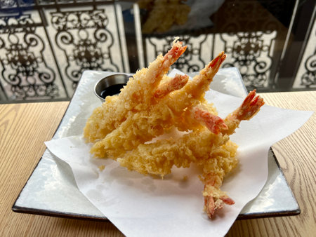 fried shrimps or prawns with sauce Fried Shrimp in batter on plates with lemonの写真素材