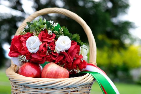 basket with apples in garden and wreath ukrainian national headdress symbols of ukraine invincibility strength patriotism feed the whole world help people victory in war joy happiness world. No warの写真素材