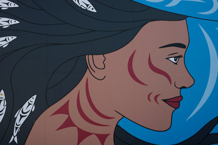 womans face drawing on the wall blue background mermaid port canada place downtown vancouver canada...