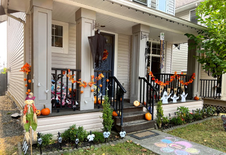 Trick or Treat Halloween decorations at home Witches hung on the porch Introducing Skeletons, Bones America brightly celebrate Halloween house is ready to receive children to give them sweetsのeditorial素材