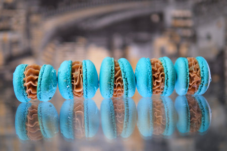 beautiful backdrop screensaver for restaurant cafe french haute cuisine blueberries roll on a glass table against a blue background macaroons delicious food french breakfast dessertの写真素材