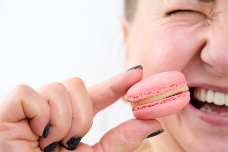 banner pastry shop cooking show courses training to cook sweet dessert satisfied and happy woman eating macaroons ad sweets goodies pleasant life pleasure buzz joy smile overweight model size plusの写真素材