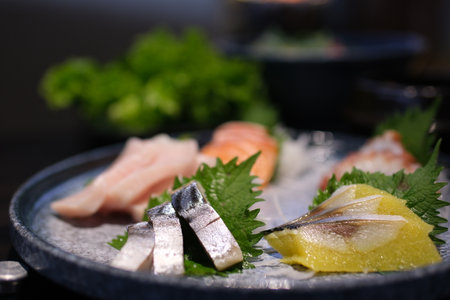 Raw fish with fresh cut served as sushiの写真素材