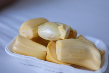 Jackfruit ripe tray jack fruit pieces arranged in transparent trays, showcasing their vibrant color...