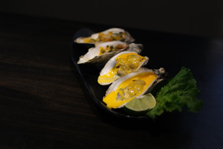Oysters baked with cheese Homemade Creamy Oysters Rockefeller with Cheese and Spinachの写真素材