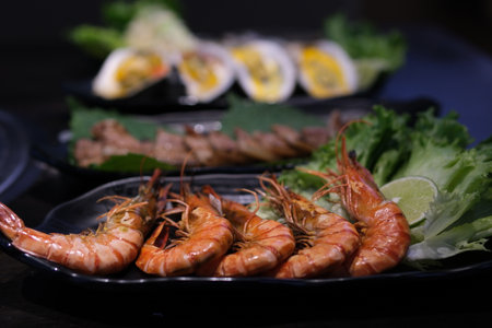 Shrimp lettuce platter Close up of fresh mediterranean seafood on ice.の写真素材