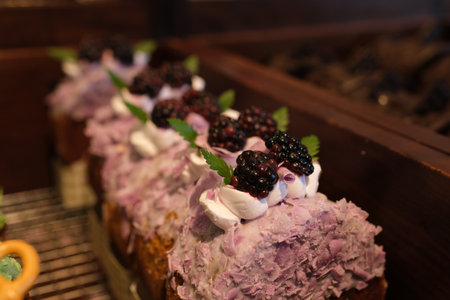 This exquisite dessert showcases modern confectionery art with its smooth purple mousse layers,...