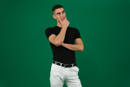 Set of videos featuring handsome European man with dark hair and expressive eyebrows wearing black t...