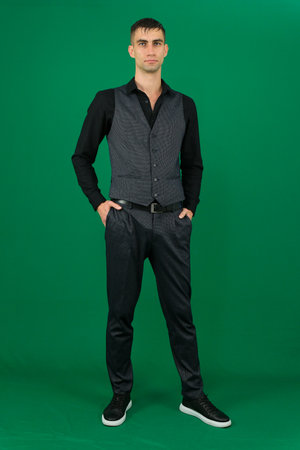Set of videos with handsome European businessman in classic suit vest and black shirt showing...