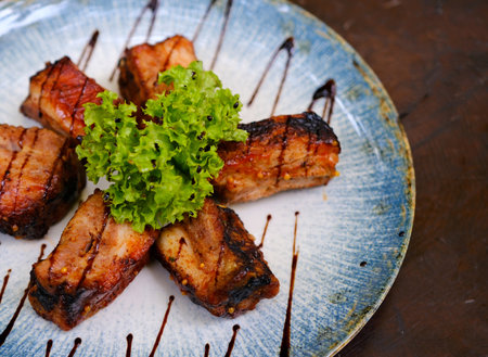 Barbecued ribs and vegetablesの写真素材