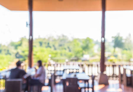 abstract blur background of restaurant in the gardenの写真素材