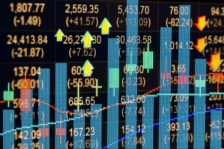 Financial data on a monitor,candle stick graph of stock market , stock market data on LED display...