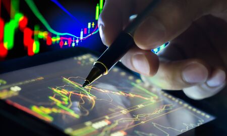 Financial data on a monitor,selective focus on LED monitor, stock market data on LED display concept