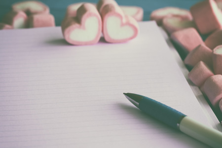 Pink heart shape marshmallow for love theme and Valentine background concept. Pile of heart. Romance pink heart pastel color. Love inspiration from sweet food. Sweet love holiday backgroundの写真素材