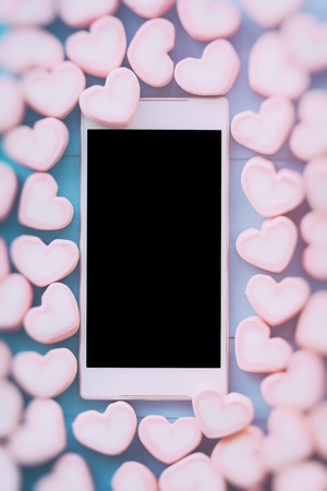 Pink heart shape marshmallow for love theme and Valentine background concept. Pile of heart. Romance pink heart pastel color. Love inspiration from sweet food. Sweet love holiday backgroundの写真素材