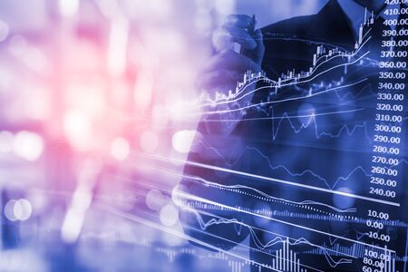 Business man on digital stock market financial indicator background. Digital business and stock...