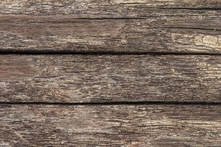 Abstract surface wood table texture background. Close up of dark rustic wall made of old wood table planks texture. Rustic brown wood table texture background empty template for your design.の写真素材