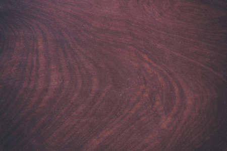 Vintage surface wood table and rustic grain texture background. Close up of dark rustic wall made of old wood table planks texture. Rustic brown wood table texture background template for your design.の写真素材
