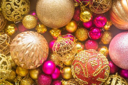 Holiday Christmas card background with festive decoration ball, stars, snowflakes, gift box, pine cones on a white background from Flat lay, top view. Space for text Merry Christmas and happy New Yearの写真素材