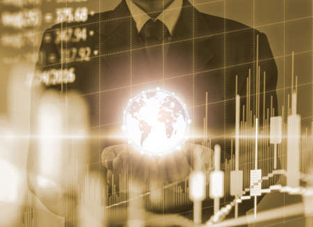 Double exposure businessman and stock market or forex graph suitable for financial investment concept. Economy trends background for business idea and all art work design. Abstract finance background.の写真素材