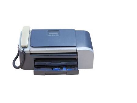 FAX machine of office stationery isolated on white backgroundの写真素材