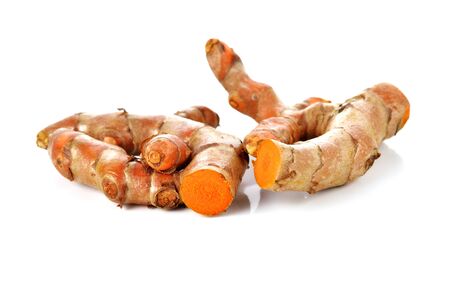 Turmeric root on white background