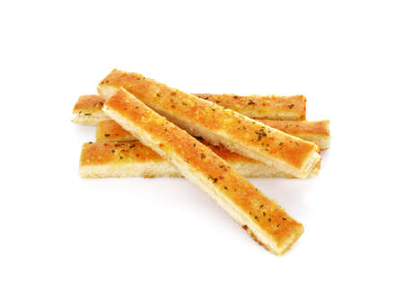 Garlic and herb bread slices on white background.の写真素材