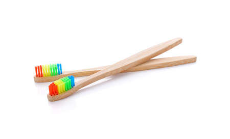 Toothbrush made of bamboo on white background.の写真素材