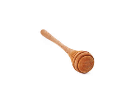 Wooden honey scoop isolated on white backgroundの写真素材