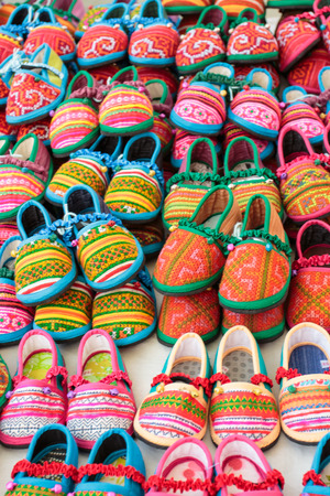 A lot of small  colorful shoesの写真素材