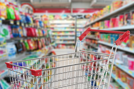 3d rendering shopping cart in supermarket alleyの写真素材