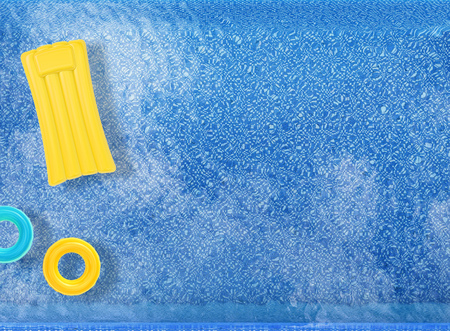 3d rendering swim rings and raft floating on pool top viewの写真素材