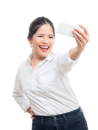 asian woman selfie with white backgroundの写真素材