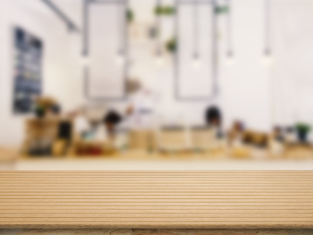 wooden counter top with restaurant blurred backgroundの写真素材
