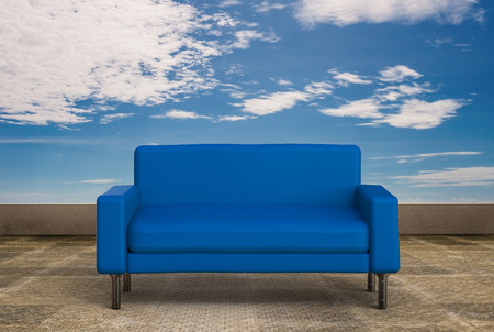 3d rendering blue sofa on terrace with blue sky backgroundの写真素材