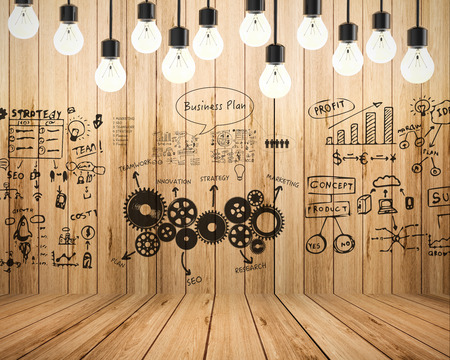 business plan with chart on wooden backgroundの写真素材