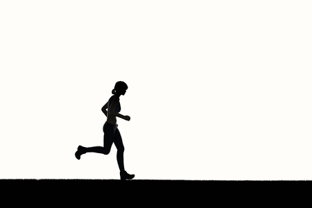 silhouette woman running or female runnerの写真素材
