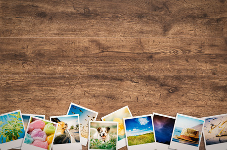 travel photo collage on wooden backgroundの写真素材