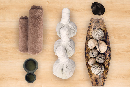 spa and massage accessories on wooden backgroundの写真素材