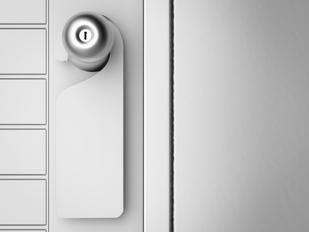 blank sign hanging with door knobの写真素材