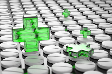 health and safety concept with green cross on pills backgroundの写真素材