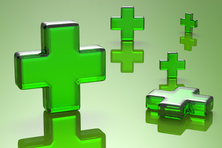 safety first aid with green cross on green backgroundの写真素材