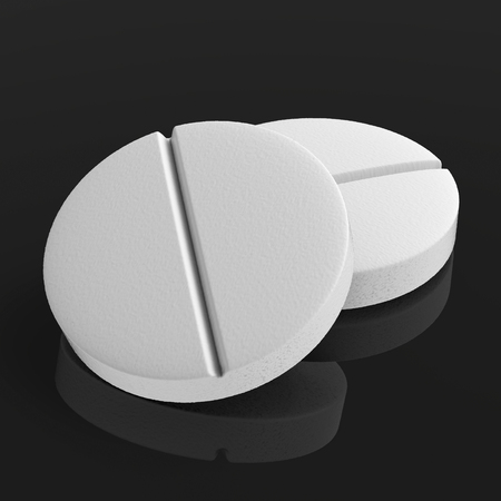 3d rendering white pills on black backgroundの写真素材
