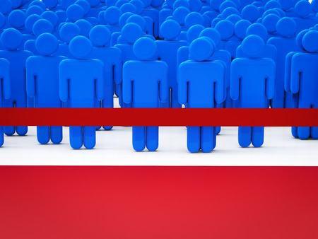 people waiting behind the red lineの写真素材