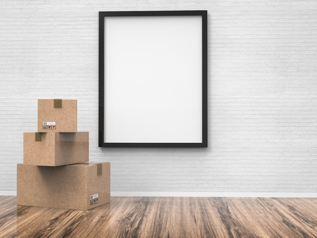 blank black frame hanging on wall with carton box